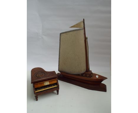 Hardwood sailing boat table lamp and a musical grand piano trinket box 