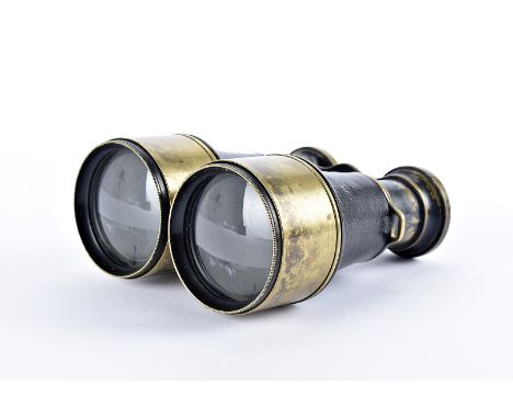 A pair of early 20th Century field glasses, by Kelvin, White & Hutton, 11 Billiter Street London, the brass body, having leat