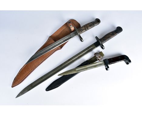 A British 1907 Pattern bayonet by Wilkinson, together with a 1913 dated Remington bayonet with scabbard, plus a 6X2 AK47 bayo