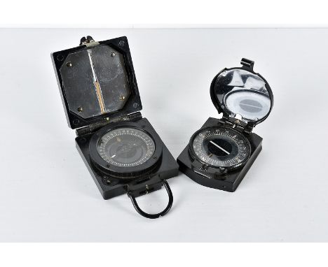 A military issue Compass Magnetic Marching Mark I, marked with broad arrow, serial B280379 by T.G.Co.Ltd, together with anoth