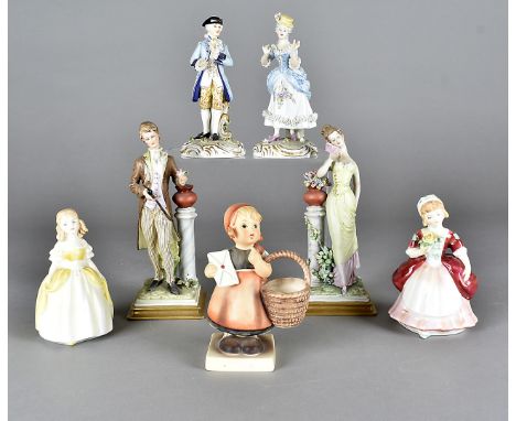 A collection of porcelain and pottery figures, including a Hummel figure of a young girl with envelope and basket, a pair of 
