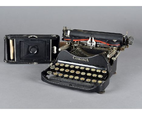 A folding Corona typewriter, with QWERTY keyboard in black enamel together with an Ensign Houghtons Ltd London cased folding 