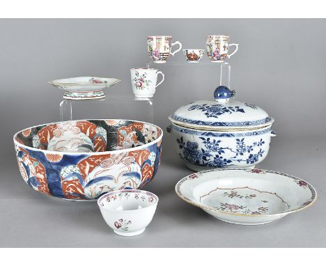 An early 19th century tureen and cover, the blue and white tureen with fruit finial, together with a pair of Famille rose sou