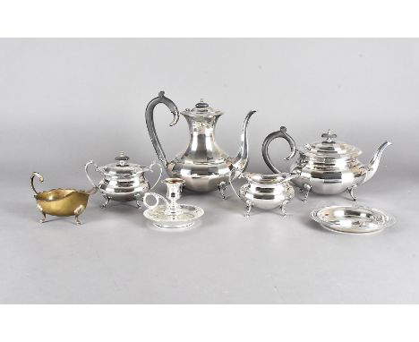 A four piece silver plated tea set, chamber stick, and other items 