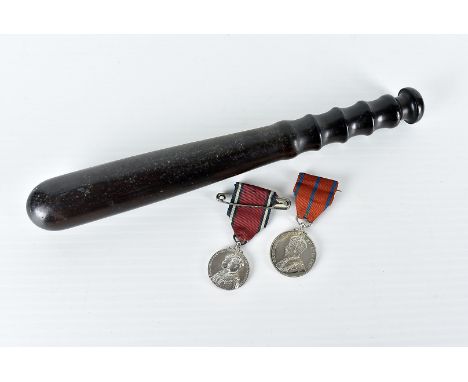 A George V Metropolitan Police Coronation 1911 medal, awarded to PC J HENDERSON, together with a Jubille 1935 medal, plus a w