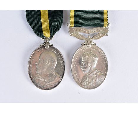 An Edward VII Territorial Force Efficiency medal, awarded to 84 PTE J.WHITE 10/ MANCH.REGT, together with a George V Efficien