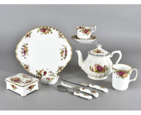 A six place setting Royal Albert 'Old Country Roses' tea service, with bread and butter plates, bells,comports and various ot