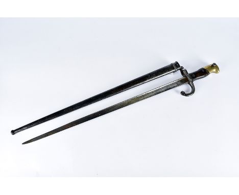 A French T-Back sword bayonet, marked Mre d'Armes de St Etienne 1879, with marriaged metal scabbard (2) 