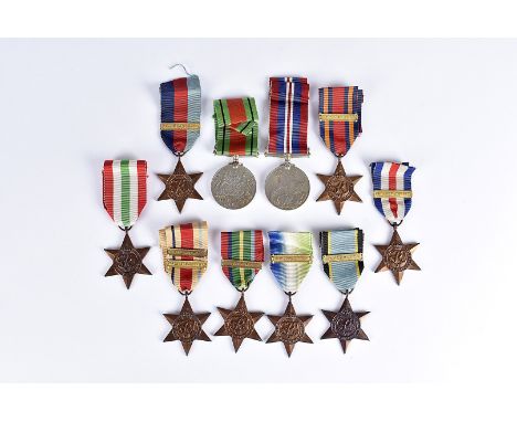 A extensive WWII medal group, comprising War and Defence medal, the 1939-45 Star with Battle of Britain clasp, the Africa Sta