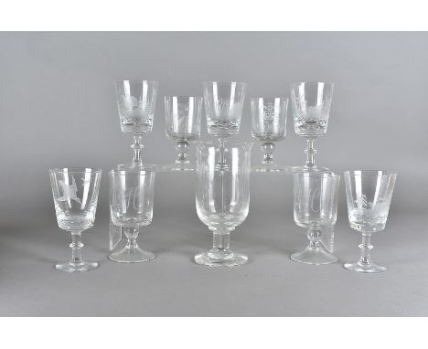 A set of five engraved wine glasses, depicting game birds together with three diamond engraved wildlife goblets and a Darting