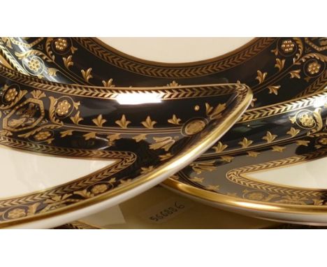 Four Wedgwood Astbury crescent side plates. Length 20cm. 