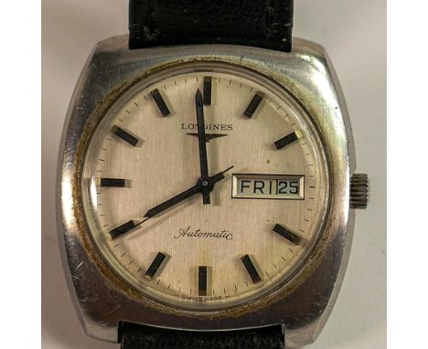 Longines day date automatic gents wrist watch. Measures 37mm, not including button. Not in working order. 