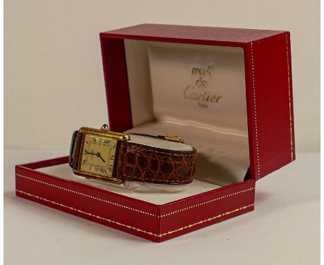 Cartier gentleman's Vermeil Tank quartz watch with leather strap, Silver Gilt marked 925 in original box. Not working. 