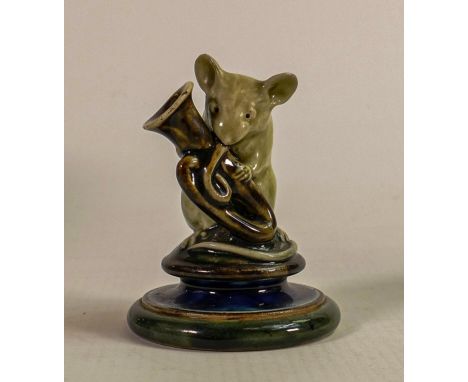 George Tinworth for Doulton Lambeth, a comical figure of a mouse playing a trumpet, in a two tone green, brown and blue colou