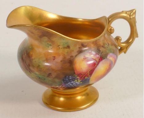 Royal Worcester gilded cream jug, hand painted with fruit by Price, h.7.5cm. 