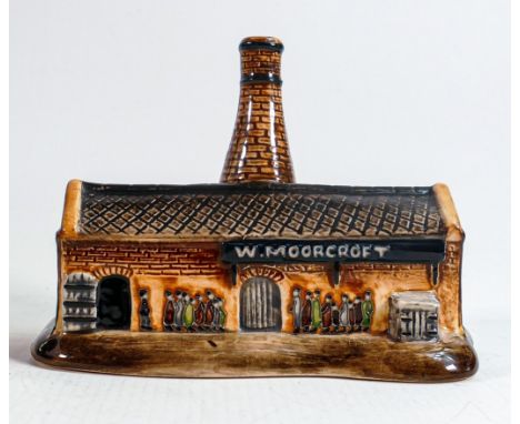 Moorcroft model of factory shop / pot bank paperweight, marked trial 2011, height 11cm. 