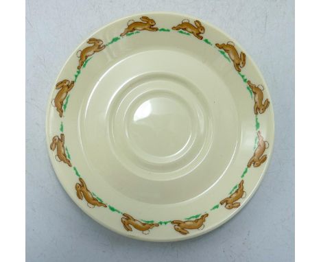 Royal Doulton Bunnykins items to include -Christening cups and saucers, loose cups, plates, money box &amp; a two tier cake s