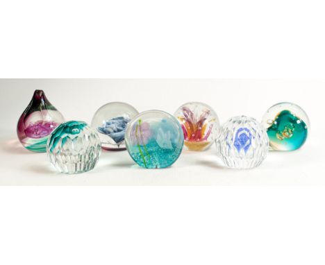 Seven Caithness paperweights including Blue Rose, Gulf Stream, Celestial Crystal etc. 