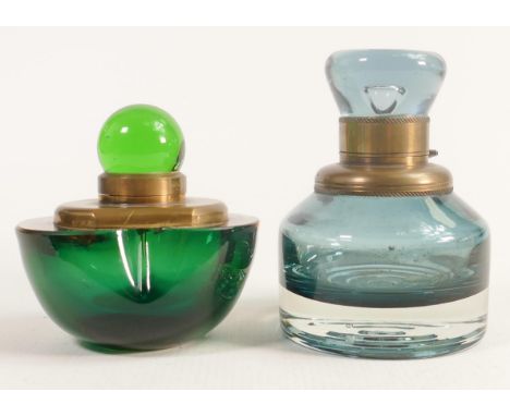 Heavy coloured glass inkwells with brass mounts, tallest 12cm. Chip / crack to edge of green item. (2) 