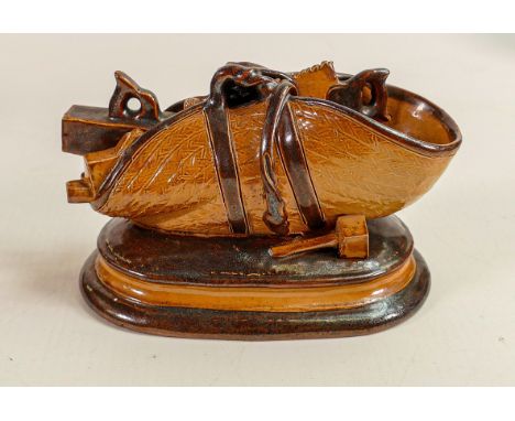 A Doulton Lambeth stoneware novelty desk tidy, in the form of a carpenters bag of tools, attributed to George Tinworth, impre