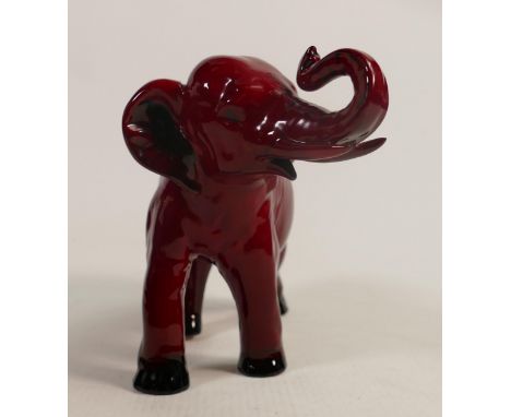 Royal Doulton Flambe elephant with trunk in salute, height 14cm. 