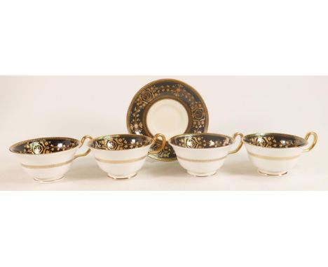 Four Wedgwood Astbury twin handled soup cups together with three matching saucers. 