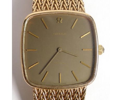 Omega de Ville 9ct gents watch and 9ct bracelet. Winds, ticks, runs down and hands set. Gross weight 63.7g, case diameter 29m