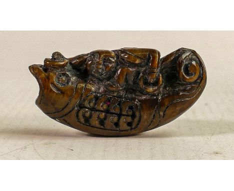 19th century carved Jade figure of boy riding a fish, length 5.2cm. 