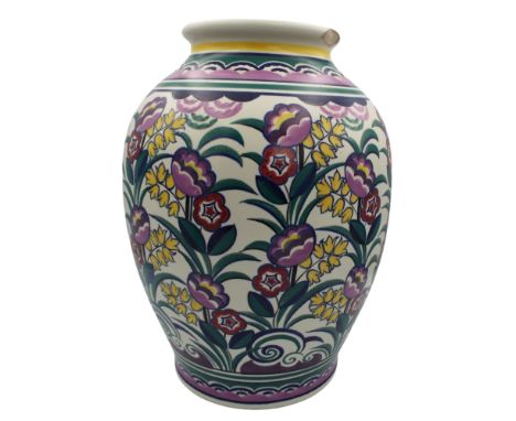 A large Poole pottery vase signed Gwen Haskins decorated with flowers, height 34cm.    Condition report, chip to rim approxim