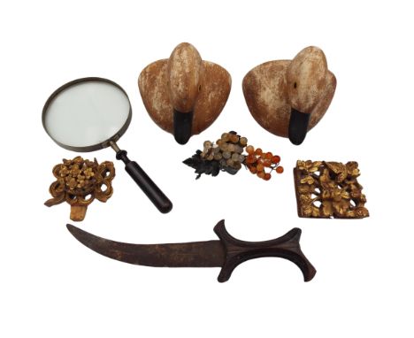 A North African dagger together with two Chinese gilt wood carved panels, Chinese hardstone fruit, a large magnifying glass a