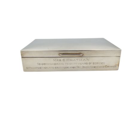 A silver cigarette box Birmingham 1974 Garrard &amp; Co Ltd inscription to front, height 3.5cm width 14cm depth 9cm.&nbsp;&nb