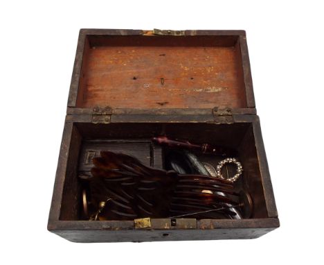 A brass studded casket containing two fountain pens, Vulcanite mourning pendant and brooch, two hairpins, George III half cro