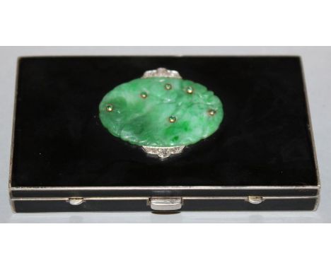 A GOOD FRENCH JADE AND DIAMOND MOUNTED COMPACT. 
