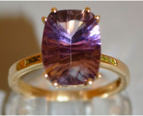 A GOOD AMETHYST DRESS RING set in 9ct gold. 