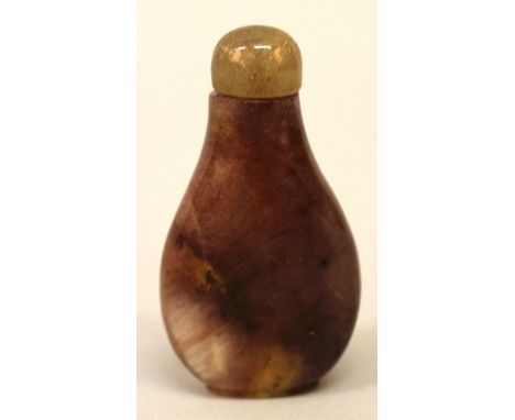 A GOOD UNUSUAL CHINESE QUARTZ SNUFF BOTTLE & STOPPER, of flattened pear-form, the stone of predominantly purple hue with ligh