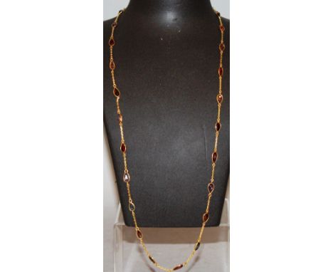 A GOOD 18CT GOLD AND RUBY NECKLACE. 