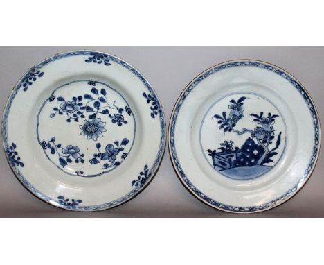 TWO DELFTWARE ENGLISH BLUE AND WHITE PLATES, floral decoration. 