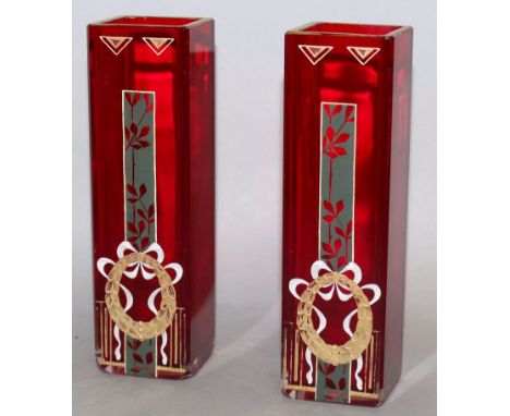 A PAIR OF ART DECO RUBY SQUARE VASES with enamel decoration. 6ins high. 
