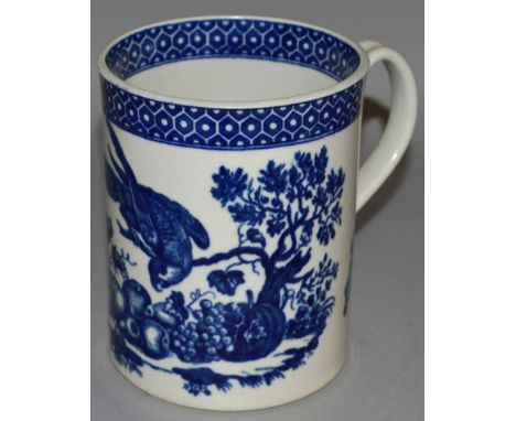 A CAUGHLEY BLUE AND WHITE TANKARD, CIRCA 1785, parrot picking fruit pattern 5.25ins high. 