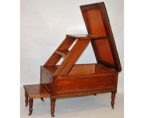 A 19TH CENTURY MAHOGANY METAMORPHIC STOOL with leather upholstered seat opening to reveal a set of library steps, with furthe