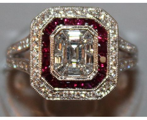 A SUPERB RUBY AND DIAMOND CLUSTER RING set in 18ct white gold. 