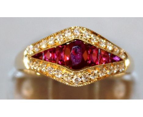 A SUPERB RUBY AND DIAMOND RING set in 18ct yellow gold. 