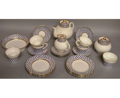 A GOOD QUALITY RUSSIAN HAND DECORATED BLUE, WHITE AND GILT TEA SET, stamped ST PETERSBURG, RUSSIA, comprising teapot and cove