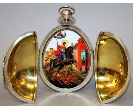 A GOOD RUSSIAN SILVER EGG TRIPTYCH by PAVEL OVCHINNIKOV, the outer case with blue enamel stripes and crosses, the front opens