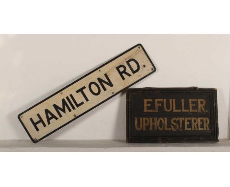 A metal road sign Hamilton Rd, 96cm wide, together with a sign E. FULLER, UPHOLSTERER (2)
