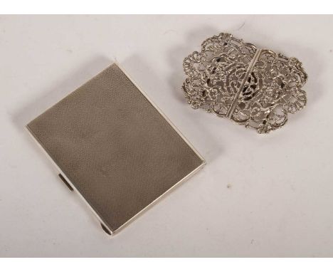 A silver nurse's belt buckle, hallmarked for Birmingham 1984, 55g, together with a silver cigarette case, stamped 800, 113g