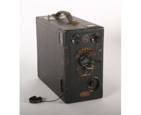 A vintage Midg No. 0 quarter plate camera, wooden with leatherette covering, containing two plate holders