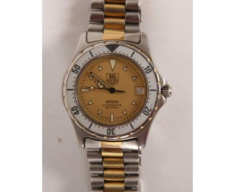 A Tag Heuer men's stainless steel wristwatch, the champagne dial inscribed "2000 Professional 200 Meters"