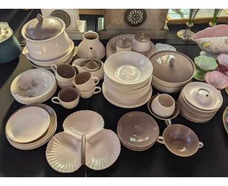 A collection of Poole brown glazed dinner wares
