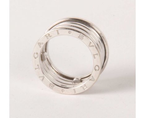 A Bulgari 18 carat white gold ring, having an expanding coil action, approximately size L, 12.2g